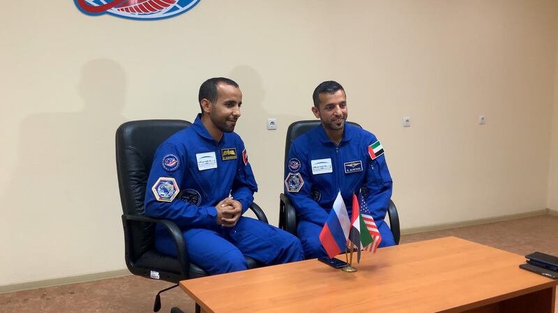 KAZAKHSTAN - September 23, 2019: Astronaut Major Hazza Al Mansouri who will launch into space on September 25th (L) and Dr Sultan Al Neyadi, a member of the mission’s back-up crew (R), speak over the phone to HH Sheikh Mohamed bin Zayed Al Nahyan, Crown Prince of Abu Dhabi and Deputy Supreme Commander of the UAE Armed Forces.

( Handout )
---