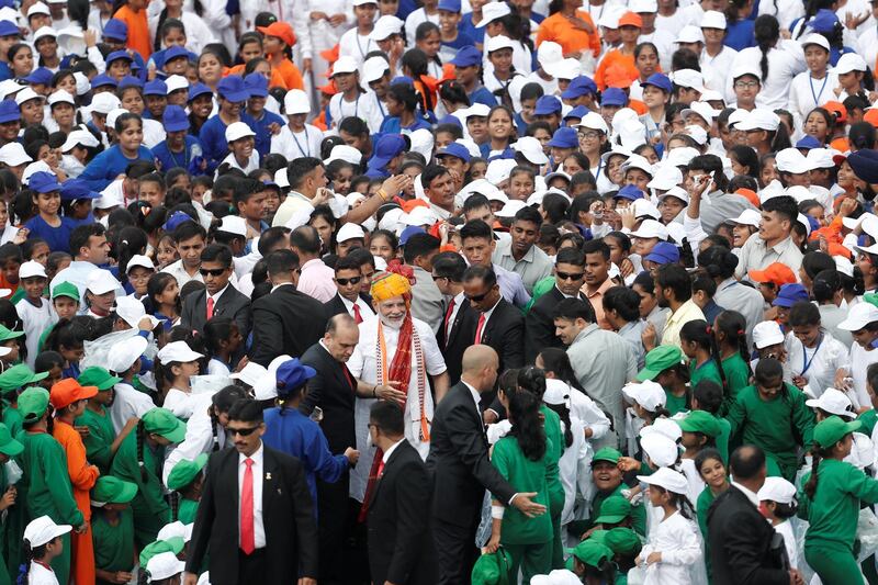 Narendra Modi meets schoolchildren after addressing his nation during Independence Day celebrations at the Red Fort. Reuters