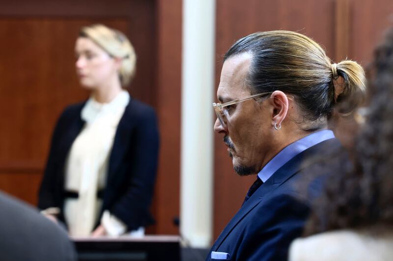 Heard and Depp in the courtroom. AP
