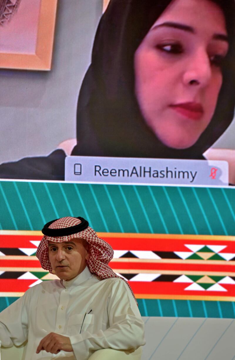 Saudi Foreign Minister Adel al-Jubeir addresses G20 panel labelled “G20 to reconnect the world” with UAE's Minister of State for International Cooperation Reem al-Hashimy attending virtually, at the International Media Centre in Riyadh.  AFP