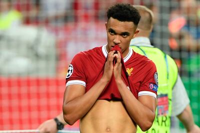 Liverpool's English defender Trent Alexander-Arnold reacts on the pitch after the UEFA Champions League final football match between Liverpool and Real Madrid at the Olympic Stadium in Kiev, Ukraine on May 26, 2018. Real Madrid defeated Liverpool 3-1. / AFP / Paul ELLIS
