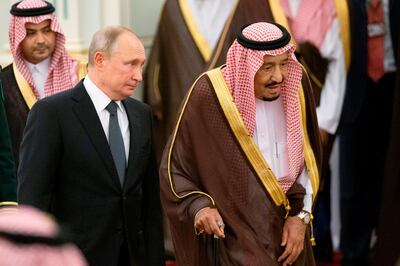 Russian President Vladimir Putin (L) and Saudi Arabia's King Salman (R) attend the official welcome ceremony in Riyadh, Saudi Arabia, on October 14, 2019. / AFP / POOL / Alexander Zemlianichenko
