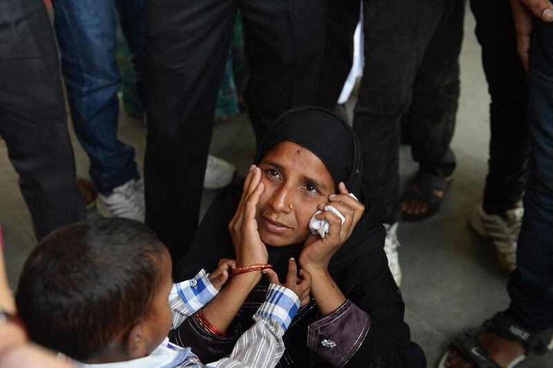 Indian woman, Hazra Begum from Farrukhabad sits with her child waiting for the train at the Hathras Junction. She and her husband Abrar Ahmad want the next government to provide proper schooling and medical support to their young family. Although Congress brought in legislation to guarantee free schooling for all children aged between six and 14, the Ahmads shell out 400 rupees each month on private education. “I don’t want to ruin my children’s future by sending them to government schools where teachers hardly show up,” said Ahmad, 28. 