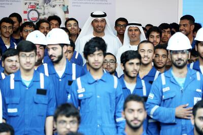 ABU DHABI , UNITED ARAB EMIRATES , NOV 7   – 2017 :- Dr Sultan Ahmed Al Jaber , Group CEO of the ADNOC ( center back ) posing for the group photo with trainees after the opening of Adnoc Technical Academy at the Al Shawamekh area in Abu Dhabi. (Pawan Singh / The National)