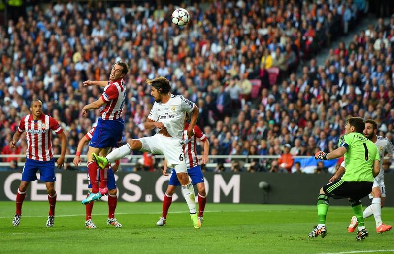 Diego Godin of Atletico Madrid heads in the first goal during against Real Madrid in the Champions League final on Saturday, putting Atletico 1-0 up at the time. Shaun Botterill / Getty Images / May 24, 2014