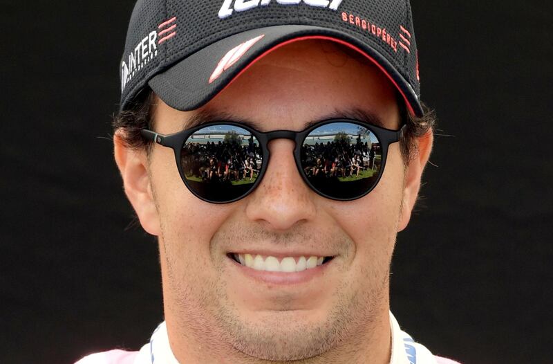 FILE PHOTO: Formula One F1 - Australian Grand Prix - Melbourne Grand Prix Circuit, Melbourne, Australia - March 12, 2020   Racing Point's Sergio Perez poses for a drivers portrait  REUTERS/Tracey Nearmy/File Photo