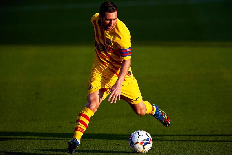 Lionel Messi on the ball during the pre-season friendly match between Barcelona and Gimnastic de Tarragona at Johan Cruyff Stadium. EPA