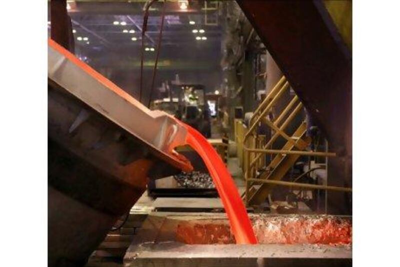 Molten aluminum is poured into a cast at Rusal's Krasnoyarsk smelter. The company accounts for 12 per cent of global output.