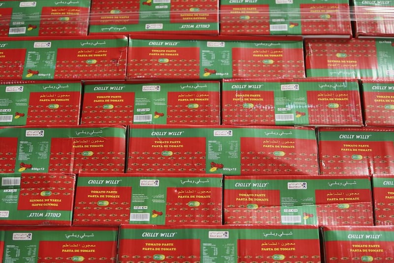 Boxes of tomato paste packets at the Chilly Willy manufacturing facility in Dubai, June 3, 2015.