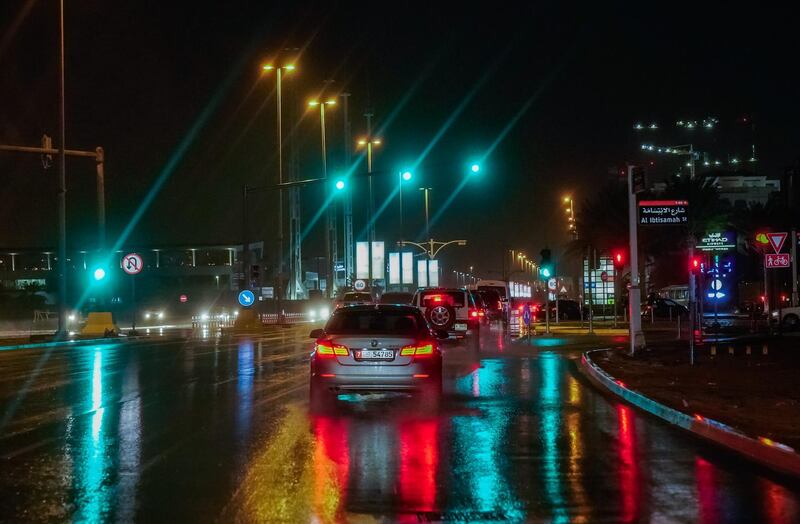Abu Dhabi, United Arab Emirates, January 9, 2020.  The wet road glitters with lights as it pours at Khalifa City.    Victor Besa / The National