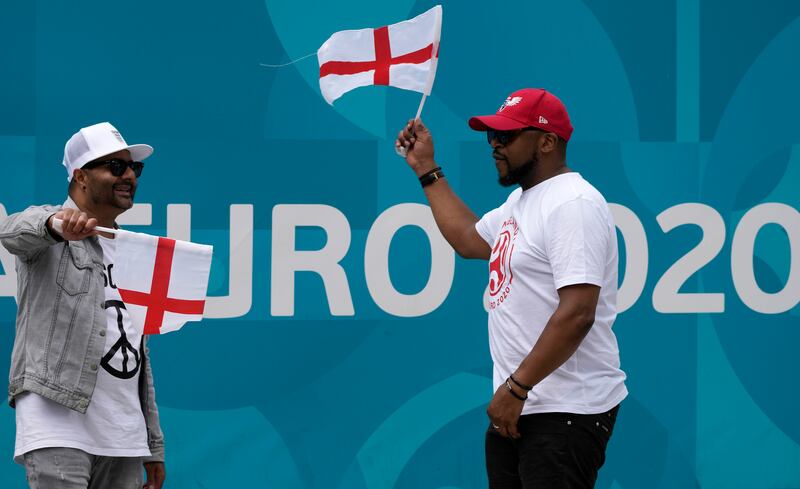 England fans show their support for the team outside Wembley Stadium on Friday.