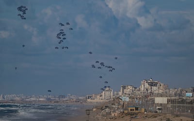 Aid is dropped into the Gaza Strip by US aircraft this month. EPA