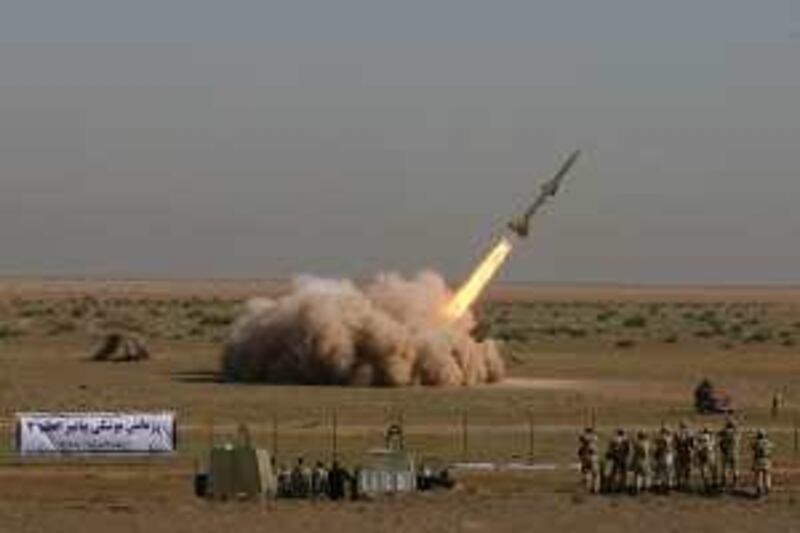 In this photo released by the Iranian semi-official Fars News Agency, Revolutionary Guard's Tondar missile is launched in a drill, Sunday Sept. 27, 2009, near the city of Qom, 80 miles (130 kilometers) south of Tehran, Iran. Iran said it successfully test-fired short-range missiles during military drills Sunday by the elite Revolutionary Guard, a show of force days after the U.S. warned Tehran over a newly revealed underground nuclear facility it was secretly constructing. (AP Photo/Fars News Agency, Ali Shaigan) *** Local Caption ***  VAH103_IRAN_MISSILE.jpg