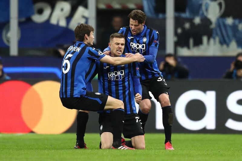 Josip Ilicic (C) celebrates with his teammates after making it 2-0. EPA