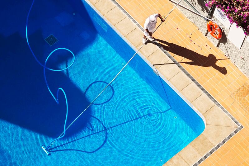 An addendum in the lease agreement states that the tenant must use the services of a pool maintenance company at least once a week. Getty Images