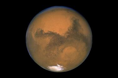 An Abu Dhabi-based researcher has found evidence to suggest lifeforms could exist beneath the surface of Mars. Nasa/AP