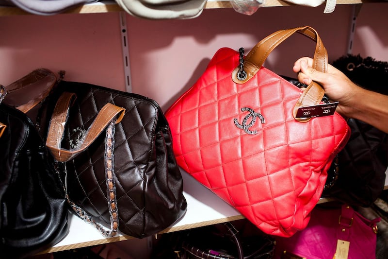 DUBAI, UNITED ARAB EMIRATES – May 12, 2011: Counterfeit handbags designed by Louis Vuitton and Chanel sit on shelves of a secret room of a store at Karama Market in Dubai. ( Andrew Henderson / The National )
 
Gonig to use these in Summer series consumers 
summer 2012