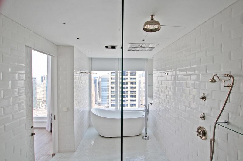 Another of the spacious bathrooms; there are five in total. Courtesy Allsopp & Allsopp