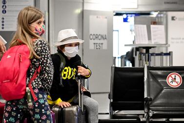 Travelers wait inside of a walk-in test center for coronavirus at the International Airport in Duesseldorf, Germany, 27 July 2020. EPA