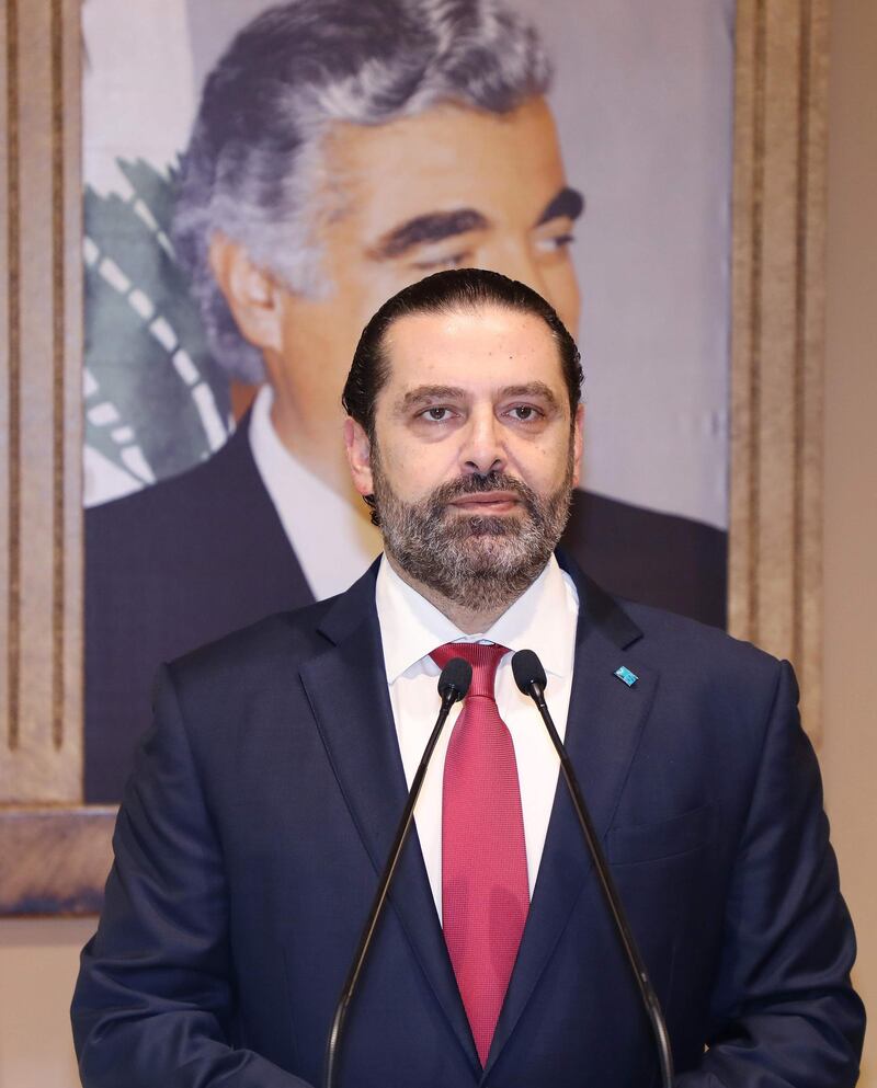 In this handout picture provided by the Lebanese photo agency Dalati and Nohra, Lebanon's Prime Minister Saad Hariri announces the resignation of his governmentt in the capital Beirut on October 29, 2019, bowing to nearly two weeks of unprecedented nationwide protests.  Hariri's express and sombre televised address was met by cheers from crowds of protesters who have remained mobilised since October 17, crippling the country to press their demands.   - === RESTRICTED TO EDITORIAL USE - MANDATORY CREDIT "AFP PHOTO / HO / DALATI AND NOHRA" - NO MARKETING - NO ADVERTISING CAMPAIGNS - DISTRIBUTED AS A SERVICE TO CLIENTS ===
 / AFP / DALATI AND NOHRA / - / === RESTRICTED TO EDITORIAL USE - MANDATORY CREDIT "AFP PHOTO / HO / DALATI AND NOHRA" - NO MARKETING - NO ADVERTISING CAMPAIGNS - DISTRIBUTED AS A SERVICE TO CLIENTS ===
