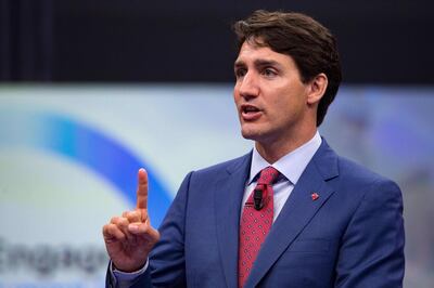 (FILES) In this file photo taken on July 11, 2018 Canada's Prime Minister Justin Trudeau addresses the 'NATO Engages: The Brussels Summit Dialogue' event ahead of the NATO (North Atlantic Treaty Organization) summit, at the NATO headquarters in Brussels. - Prime Minister Justin Trudeau expressed concern on August 23, 2018 over reports that human rights activists in Saudi Arabia face the death penalty. The two countries are locked in a diplomatic dispute triggered by Canadian criticism of the kingdom's human rights record, but Trudeau said Canada continues to "engage diplomatically" with Saudi Arabia. (Photo by GEOFFROY VAN DER HASSELT / AFP)