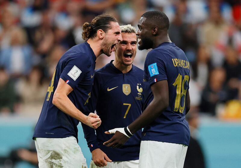 French players, left to right, Adrien Rabiot, Antoine Griezmann and Dayot Upamecano. EPA