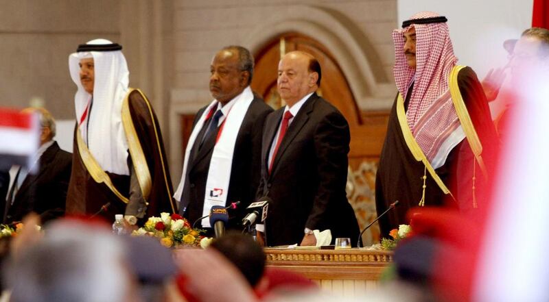 Yemen's president, Abdrabuh Mansur Hadi, centre, at the closing ceremony of the national dialogue conference in Sanaa on Saturday. Mohamed Al Sayaghi / Reuters