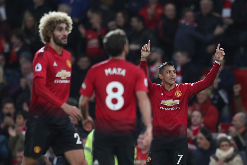 Manchester United's Alexis Sanchez celebrates after scoring his side's third goal. AP Photo