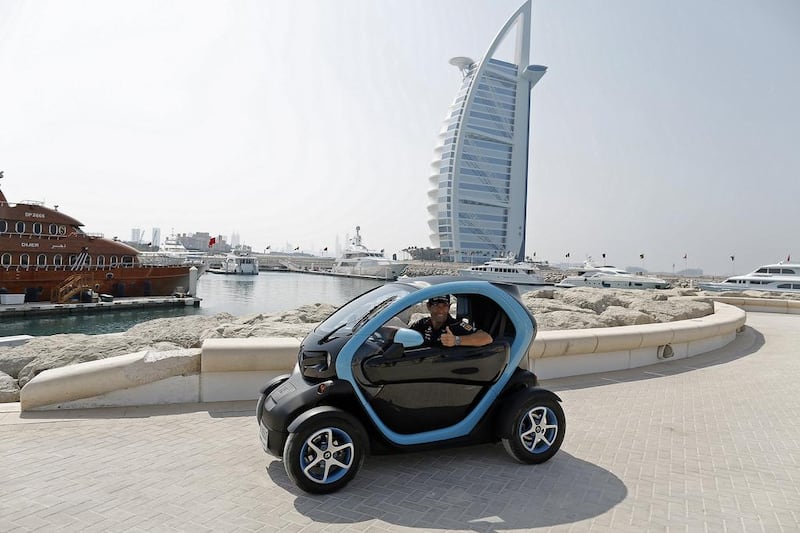Infiniti Red Bull Racing’s Mark Webber cruised through Dubai in a battery-powered electric vehicle – the Renault Twizy. Photo Courtesy-Renault