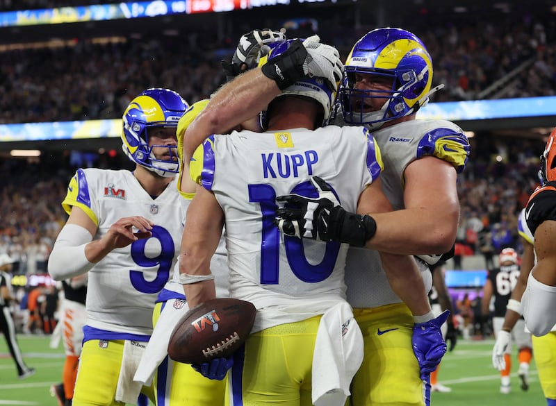Los Angeles Rams' Cooper Kupp celebrates scoring a touchdown with teammates. Reuters