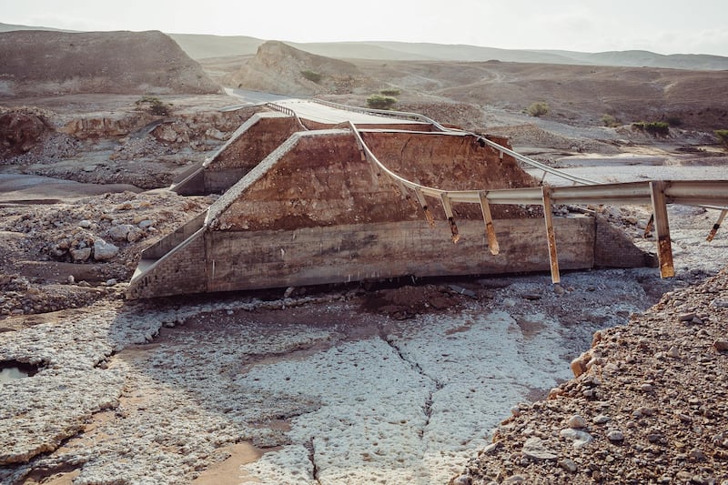 High country road, heading towards Highway 31, above Salalah, a popular spot for tourists and camel farmers. A huge section of this bridge was washed away in the storm.  Antony Hansen for The National