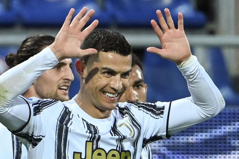 Ronaldo celebrates after scoring his third goal against Cagliari, the 770th of his career. AFP