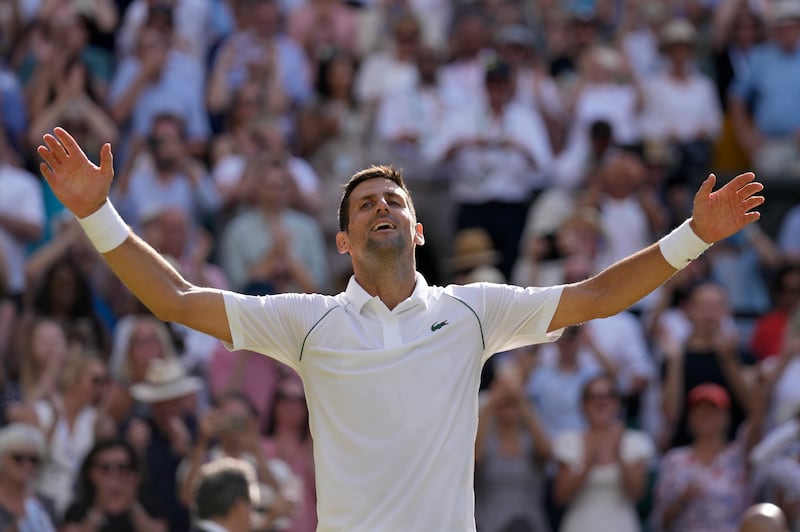 Novak Djokovic celebrates after beating Nick Kyrgios 4-6, 6-3, 6-4, 7-6. AP
