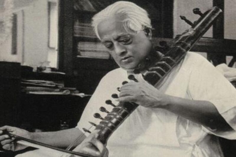 S.N. Bose playing the Esraj - Bose was an accomplished Esraj player. He is credited for composing original ragas.

Mandatory Credit: Courtesy of Falguni Sarkar. Bose Family. Used with permission. www.snbose.org"