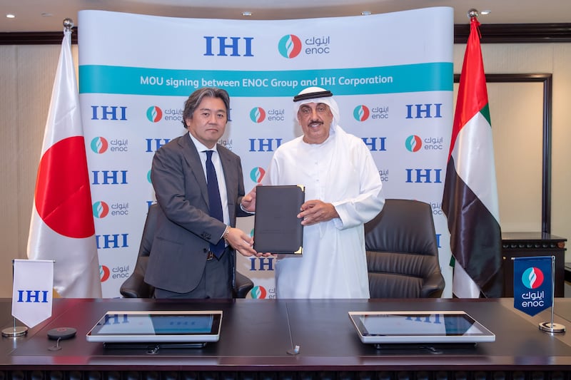 Saif Al Falasi, group chief executive of Enoc, and Jun Kobayashi, executive officer of IHI Corporation, at the signing. Photo: Dubai Media Office