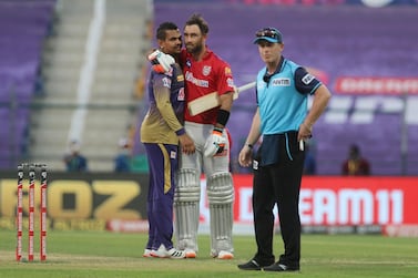 Sunil Narine, left, of Kolkata Knight Riders and Glenn Maxwell of Kings XI Punjab embrace at the end of the match at Zayed Cricket Stadium, Abu Dhabi. Sportzpics for BCCI