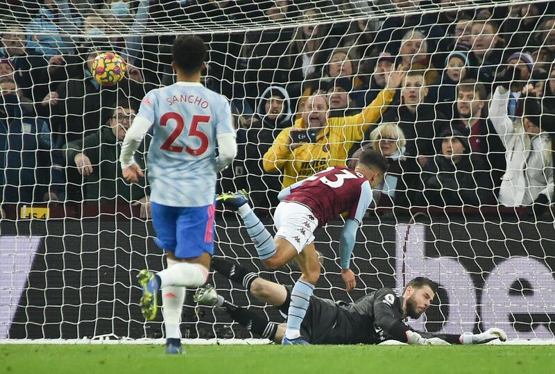 Aston Villa's Philippe Coutinho (centre), scores his side's second goal. AP