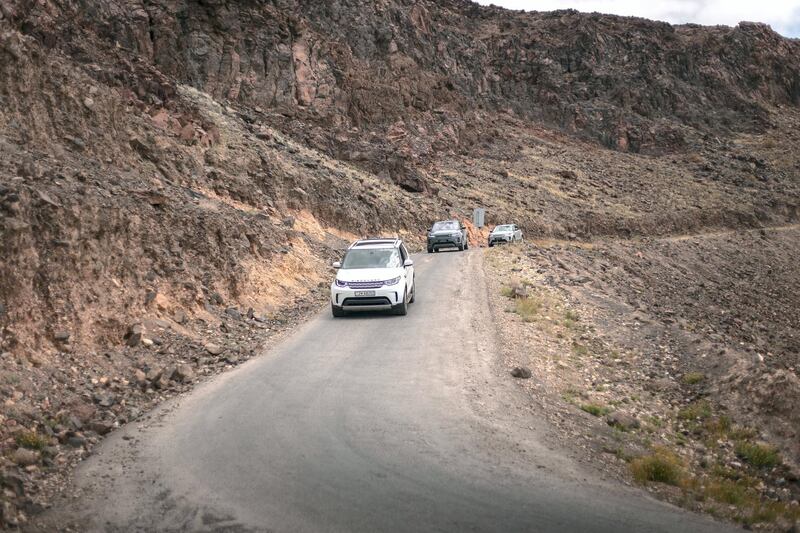 The convoy moves downhill.