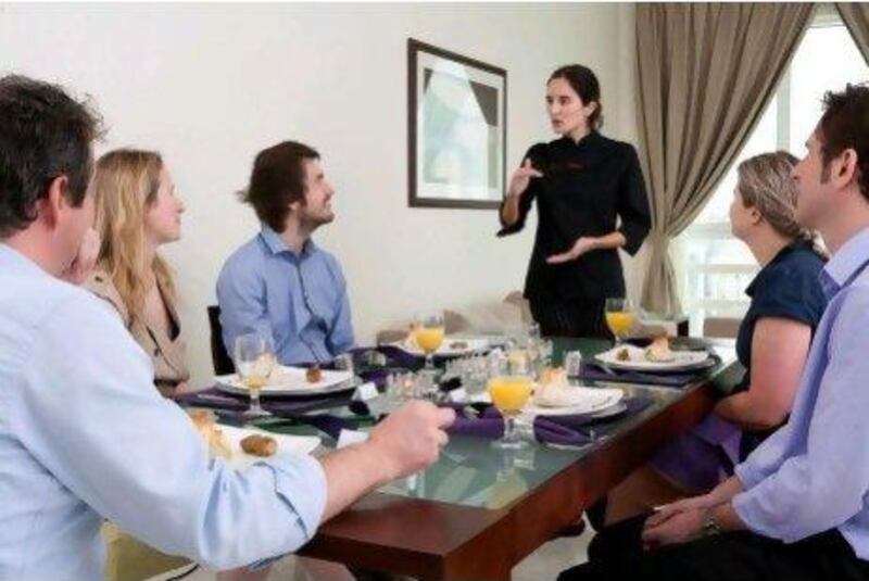 Chef Marta Yanci caters an in-home dinner for friends earlier this month.