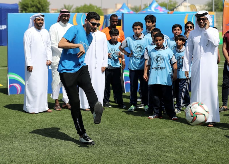 Al Ain, United Arab Emirates - October 22, 2018: Al Ain player Mohanad Salem. School children take part in different activities to promote the AFC Asian Cup. Monday, October 22nd, 2018 at Hazza Bin Zayed Stadium, Al Ain. Chris Whiteoak / The National