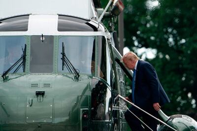 US President Donald Trump departs aboard Marine One after visiting Walter Reed National Military Medical Center in Bethesda, Maryland on July 11, 2020.   / AFP / Alex Edelman
