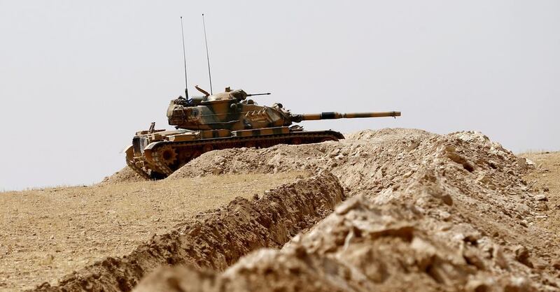 Turkish tanks prepare for a military operation at the Syrian border as part of their offensive against ISIL and Kurdish forces in Syria.  EPA/SEDAT SUNA