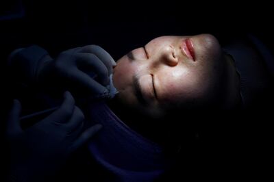 Kim Seul-ki gets Botox injection, amid the coronavirus disease (COVID-19) pandemic in Seoul, South Korea, December 15, 2020. Picture taken on December 15, 2020.  REUTERS/Kim Hong-Ji