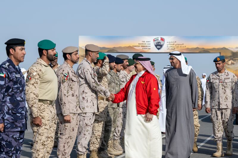 Sheikh Mohamed with King Hamad greeting members of the UAE Armed Forces. 