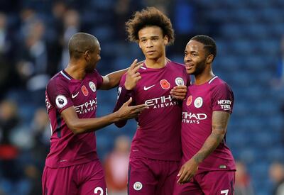 Soccer Football - Premier League - West Bromwich Albion vs Manchester City - The Hawthorns, West Bromwich, Britain - October 28, 2017   Manchester City's Fernandinho, Leroy Sane and Raheem Sterling celebrate after the match    Action Images via Reuters/Andrew Boyers    EDITORIAL USE ONLY. No use with unauthorized audio, video, data, fixture lists, club/league logos or "live" services. Online in-match use limited to 75 images, no video emulation. No use in betting, games or single club/league/player publications. Please contact your account representative for further details.