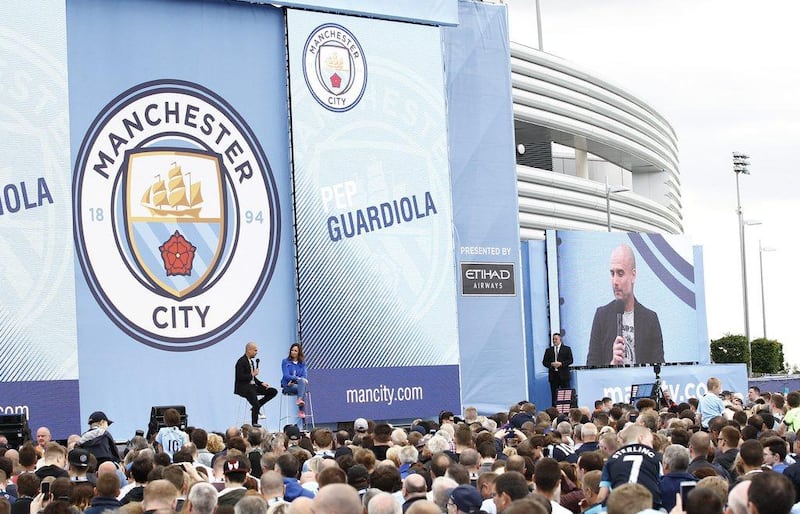 Manchester City manager Pep Guardiola is presented to the fans at the City Football Academy on Sunday. Craigh Brough / Action Images / Reuters