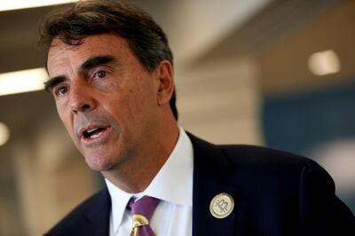 FILE PHOTO:    Venture capitalist and CAL 3 Chairman Tim Draper speaks during a press conference after announcing he has collected more than 600,000 signatures to put the plan to partition  California into three states into the November ballot in San Mateo, California, April 12, 2018. REUTERS/ Stephen Lam/File Photo