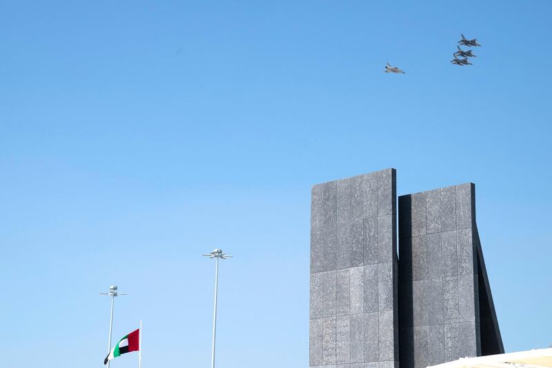 ABU DHABI, UNITED ARAB EMIRATES - November 29, 2018: Military jets perform a flyby during a Commemoration Day ceremony at Wahat Al Karama,

( Mohamed Al Hammadi / Crown Prince Court - Abu Dhabi )
---