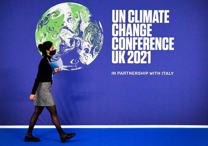 A Cop26 poster in Glasgow, Scotland. Cop26 is the biggest climate conference since the 2015 Paris summit. AFP