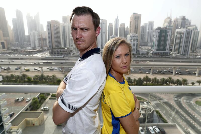 Dubai, United Arab Emirates - July 5th, 2018: Joe Limpscombe and his girlfriend Madeleine Gulldhé. Joe is English and Madeleine is Swedish, they obviously have a bit of rivalry going on now England and Sweden are facing each other in the quarter final of the world cup. Thursday, July 5th, 2018 at JLT, Dubai. Chris Whiteoak / The National